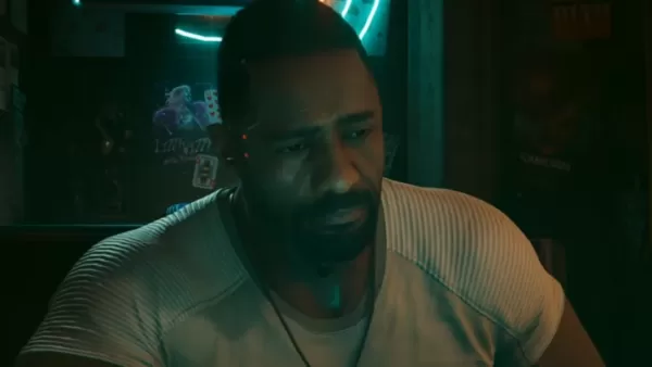 Solomon Reed, gespielt von Idris Elba, wirkt traurig in einer schattigen Cyberpunk-2077-Bar
